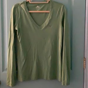 LACOSTE LONF SLEEVE GREEN TEE SHIRT.